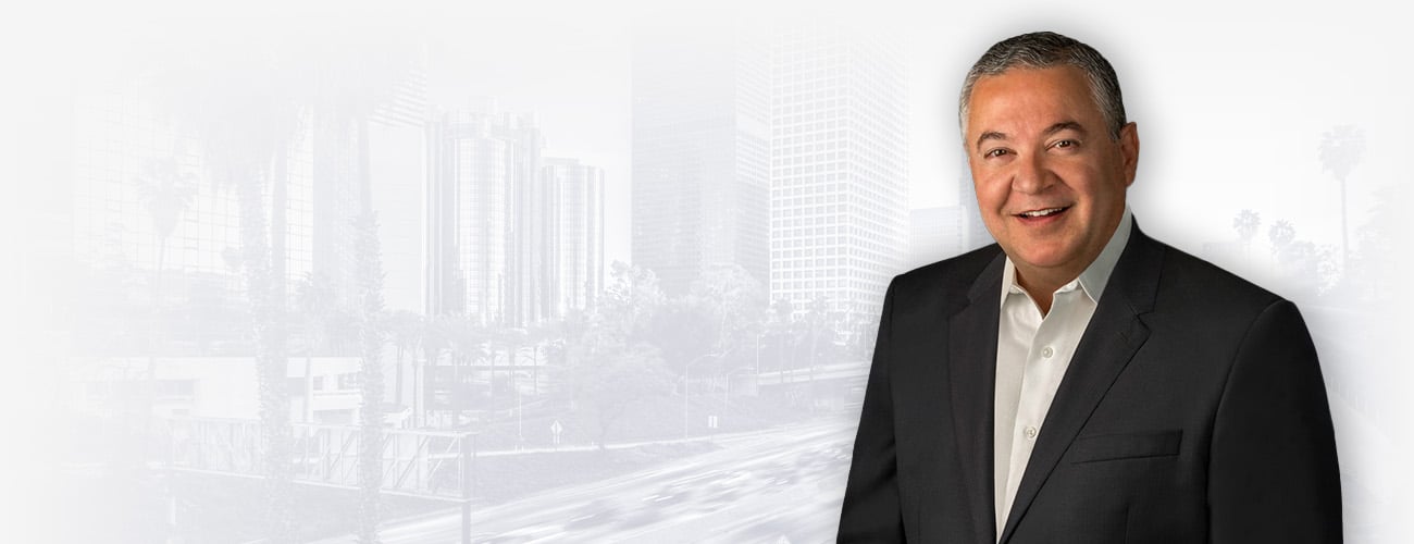 Hero Banner - Picture of Mike Habib over a city skyline